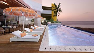2 outdoor pools, pool umbrellas, pool loungers