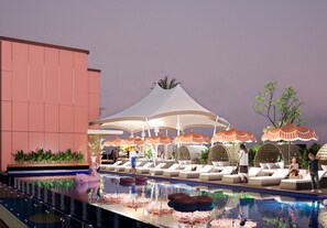 2 outdoor pools, pool umbrellas, sun loungers - The Trans Luxury Hotel Surabaya (Surabaya)