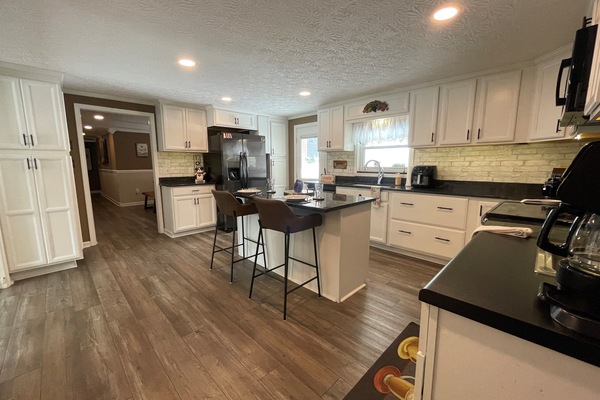 A beautiful custom kitchen ready for everything from quick breakfasts to full family dinners. Thoughtfully outfitted with appliances you won't find in most short-term rentals.