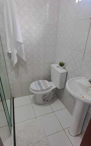 Shower, towels, soap, shampoo