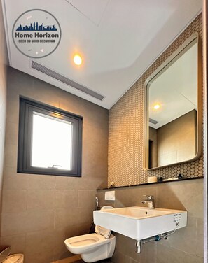 Hair dryer, towels, toilet paper