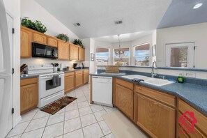 Fridge, microwave, oven, stovetop - Rancho de los Sueños with Hot Tub - An Irvie Home (Albuquerque)