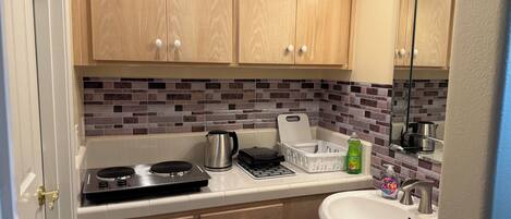 Microondas, placa de cocina