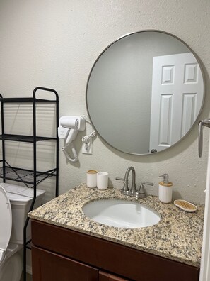 Hair dryer, towels, soap, toilet paper