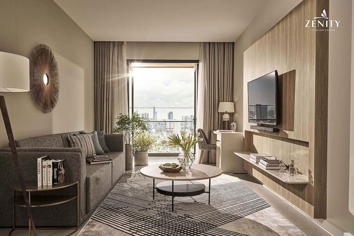 A modern living room with a sofa, coffee table, and TV.
