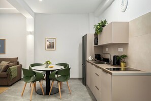 Fridge, microwave, toaster, dining tables
