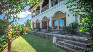 Suite Deluxe, vistas al mar | Vistas al jardín