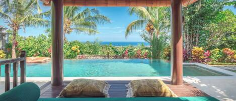 Outdoor pool, open 8:00 AM to 9:00 PM, free cabanas, pool umbrellas