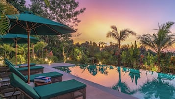 Outdoor pool, open 8:00 AM to 9:00 PM, free pool cabanas, pool umbrellas