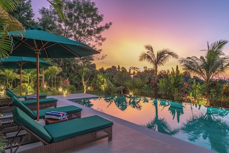 Outdoor pool, open 8:00 AM to 9:00 PM, free cabanas, pool umbrellas