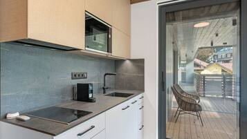 Fridge, microwave, cookware/dishes/utensils