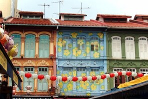 Colorful buildings with traditional architecture and decorative elements. - Heritage Collection on Pagoda - Mobile App Check-In (Singapore)