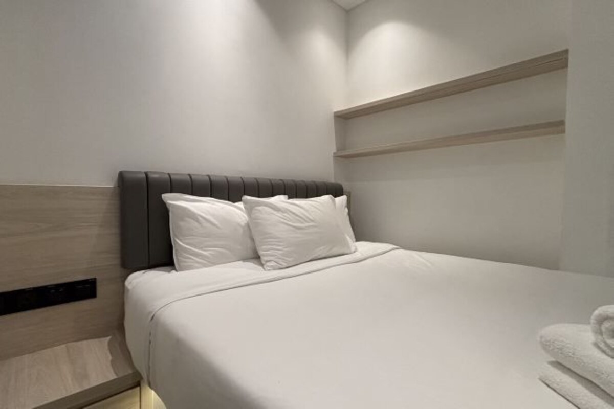 Down comforters, desk, blackout drapes, bed sheets