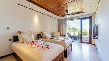 Deluxe Room, Pool View | Pillowtop beds, minibar, in-room safe, blackout drapes