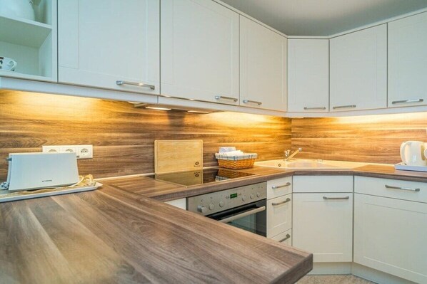 Oven, stovetop, dishwasher, coffee/tea maker