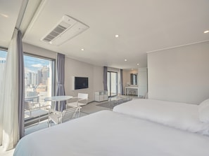 Family Room, Balcony, Partial Sea View | Free WiFi