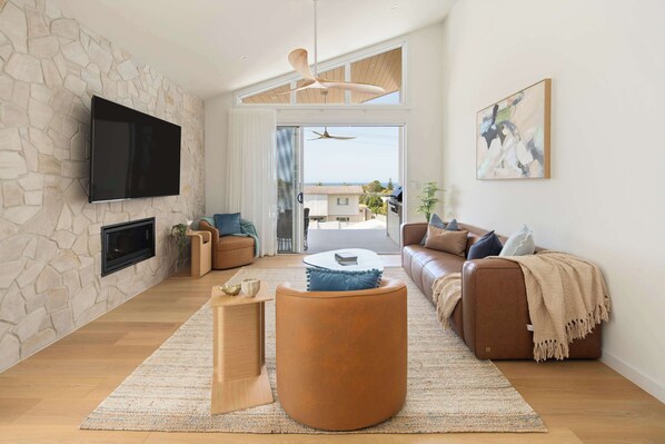 TV, fireplace, books, offices