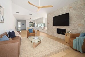 TV, fireplace, books, offices