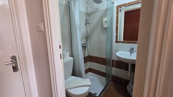 Shower, free toiletries, hair dryer, towels