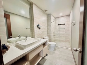Standard Double Room, City View | Bathroom | Shower, hair dryer, slippers, towels