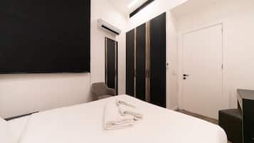 Junior Apartment | In-room safe, blackout drapes, iron/ironing board, free WiFi