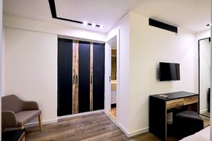 Family Apartment | In-room safe, blackout drapes, iron/ironing board, free WiFi