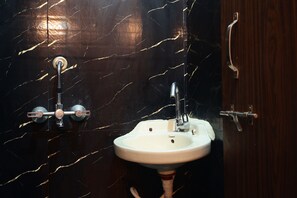 Shower, rainfall showerhead, designer toiletries, towels