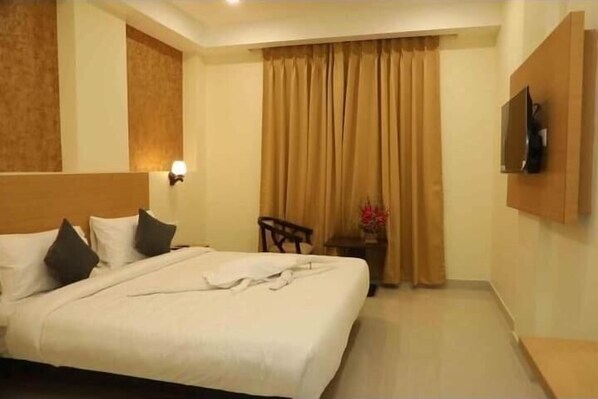 Dobbelt- eller tomannsrom – deluxe, byutsikt | Oppholdsområde