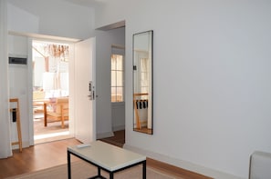 Deluxe Suite, Courtyard View | In-room safe, blackout drapes, iron/ironing board, free WiFi