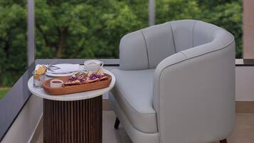 Club Double Room | Living area | 42-inch LCD TV with cable channels