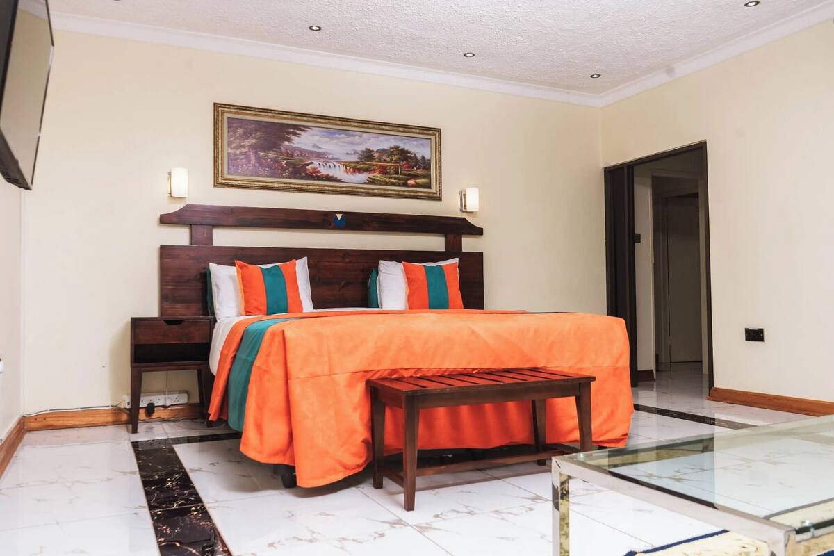 Suite Deluxe, vistas al jardín | Cortinas opacas y wifi gratis