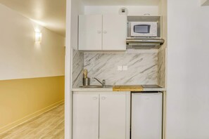 Microwave, stovetop, coffee/tea maker, toaster