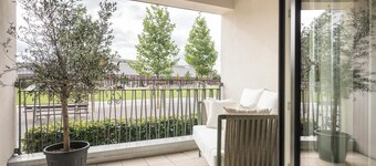 Discover the "Holiday" - Where City Living Meets cozy Tranquility!