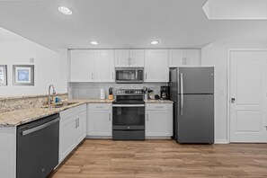 Fridge, microwave, oven, stovetop - 2BR/2BA Beach Condo: Pool & Full Kitchen (Treasure Island)