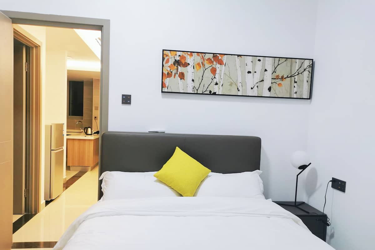 Family Suite, Balcony, City View | Desk, laptop workspace, blackout drapes, iron/ironing board