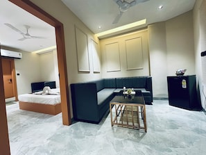 Suite Room | Living area | 32-inch flat-screen TV with cable channels - Hotel Balaji Inn, Ayodhya Bypass (Bhopal)