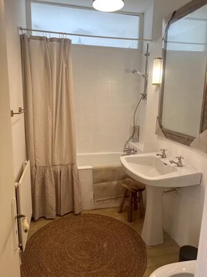 Shower, towels, soap, toilet paper