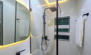 Shower, free toiletries, towels, soap