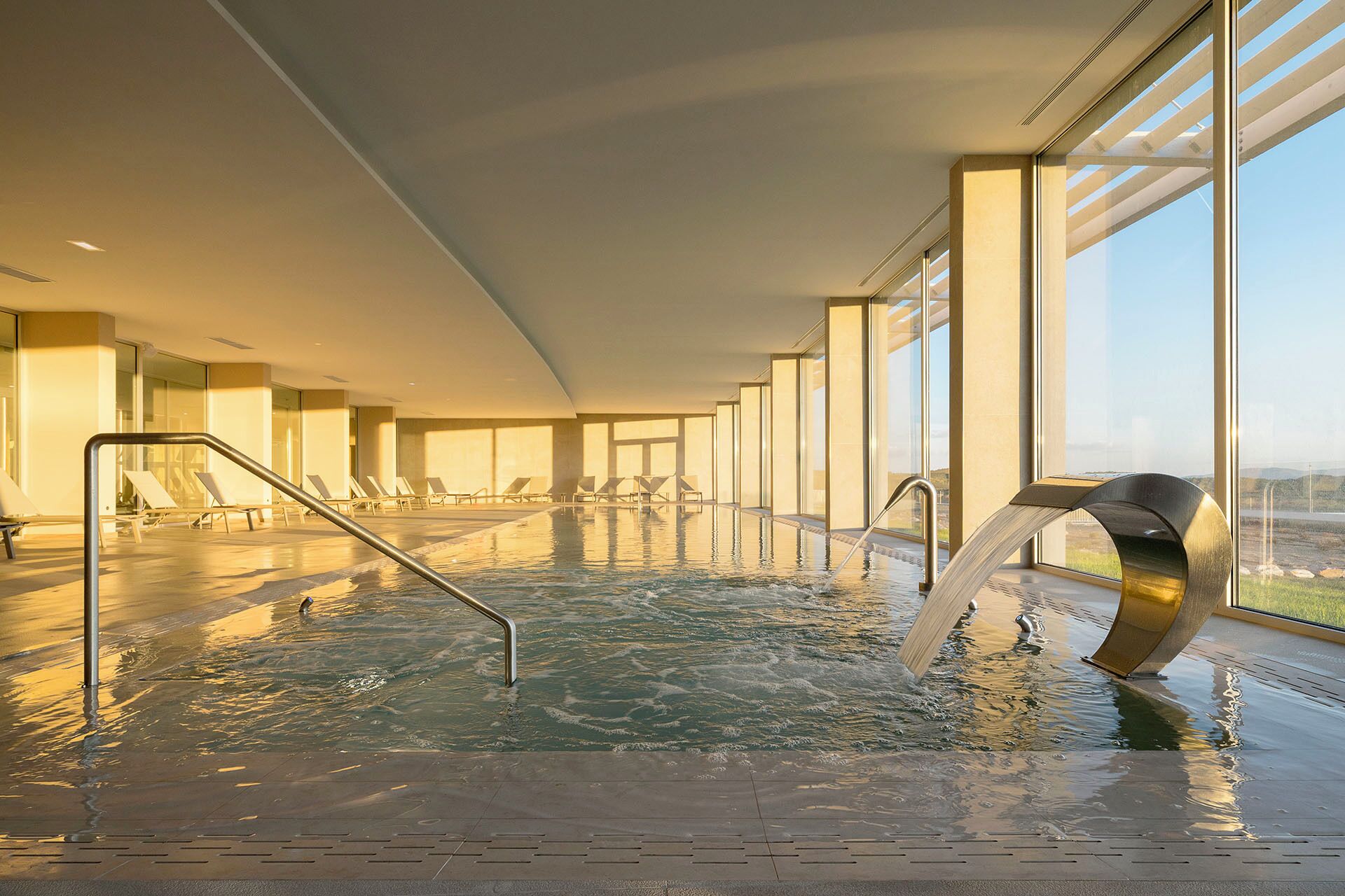 Indoor pool, outdoor pool, open 9:00 AM to midnight, pool umbrellas