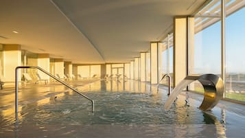 Indoor pool, outdoor pool, open 9:00 AM to midnight, pool umbrellas