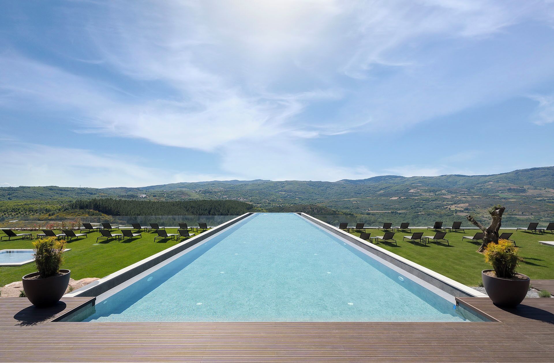 Indoor pool, outdoor pool, open 9:00 AM to midnight, pool umbrellas