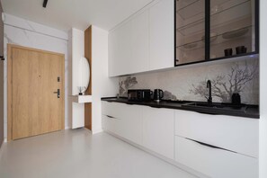 Fridge, microwave, stovetop, cookware/dishes/utensils