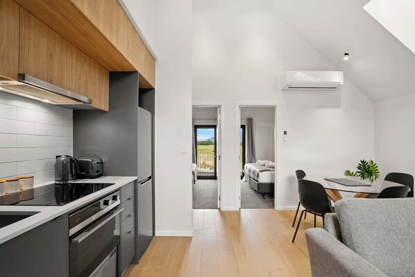 Fridge, microwave, oven, stovetop - Lake and Peaks 2 Bedroom Apartment (Jacks Point)