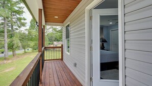 A wooden deck with a view of a bedroom. - 12 Mi to Downtown Winston-salem: Apt w/ Balcony! (Winston-Salem)
