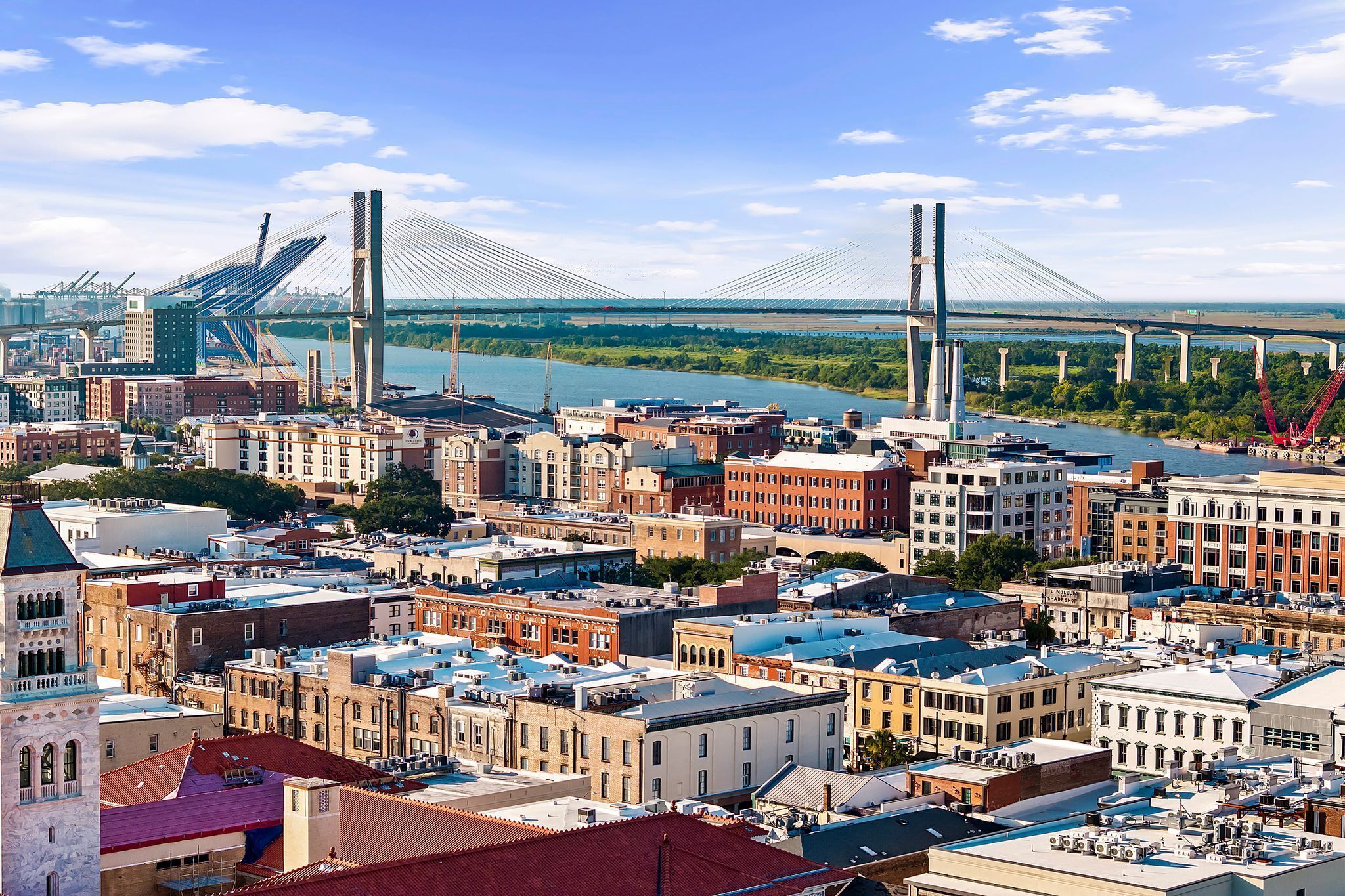 A cityscape with a prominent bridge and a river.