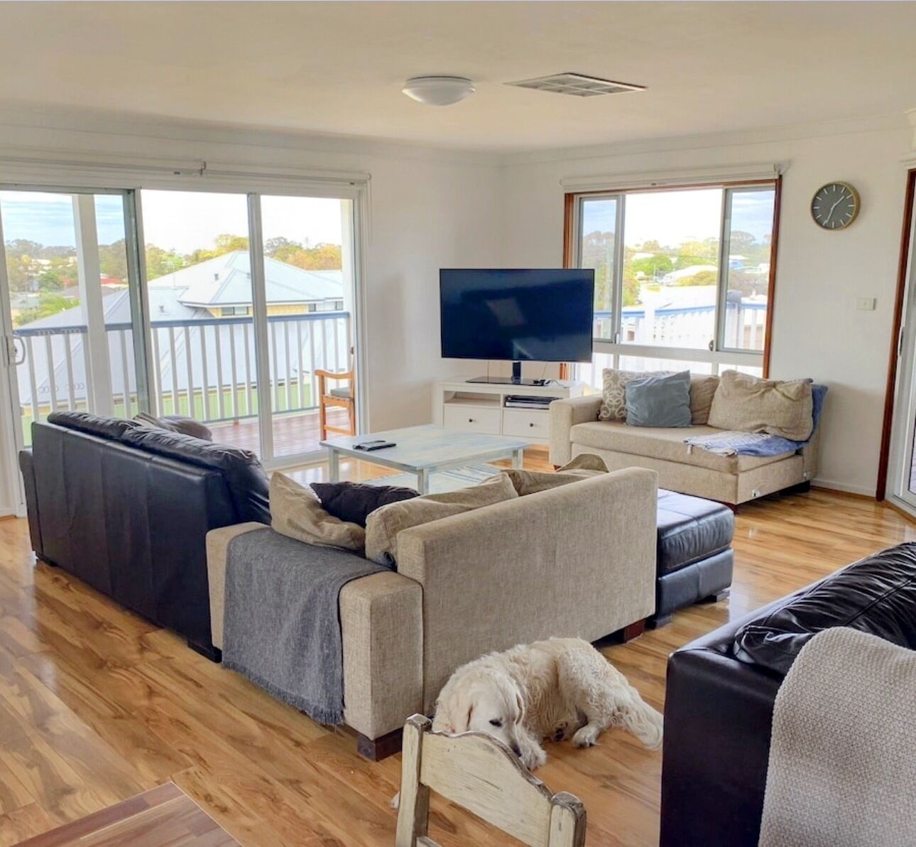 Relax and unwind in a spacious living area designed for comfort and style.

