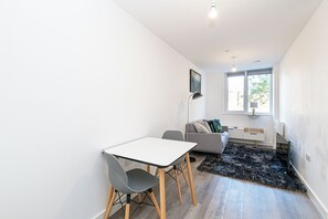 Apartment, 1 Double Bed, Pets Not Allowed | Living area | 32-inch Smart TV with digital channels
