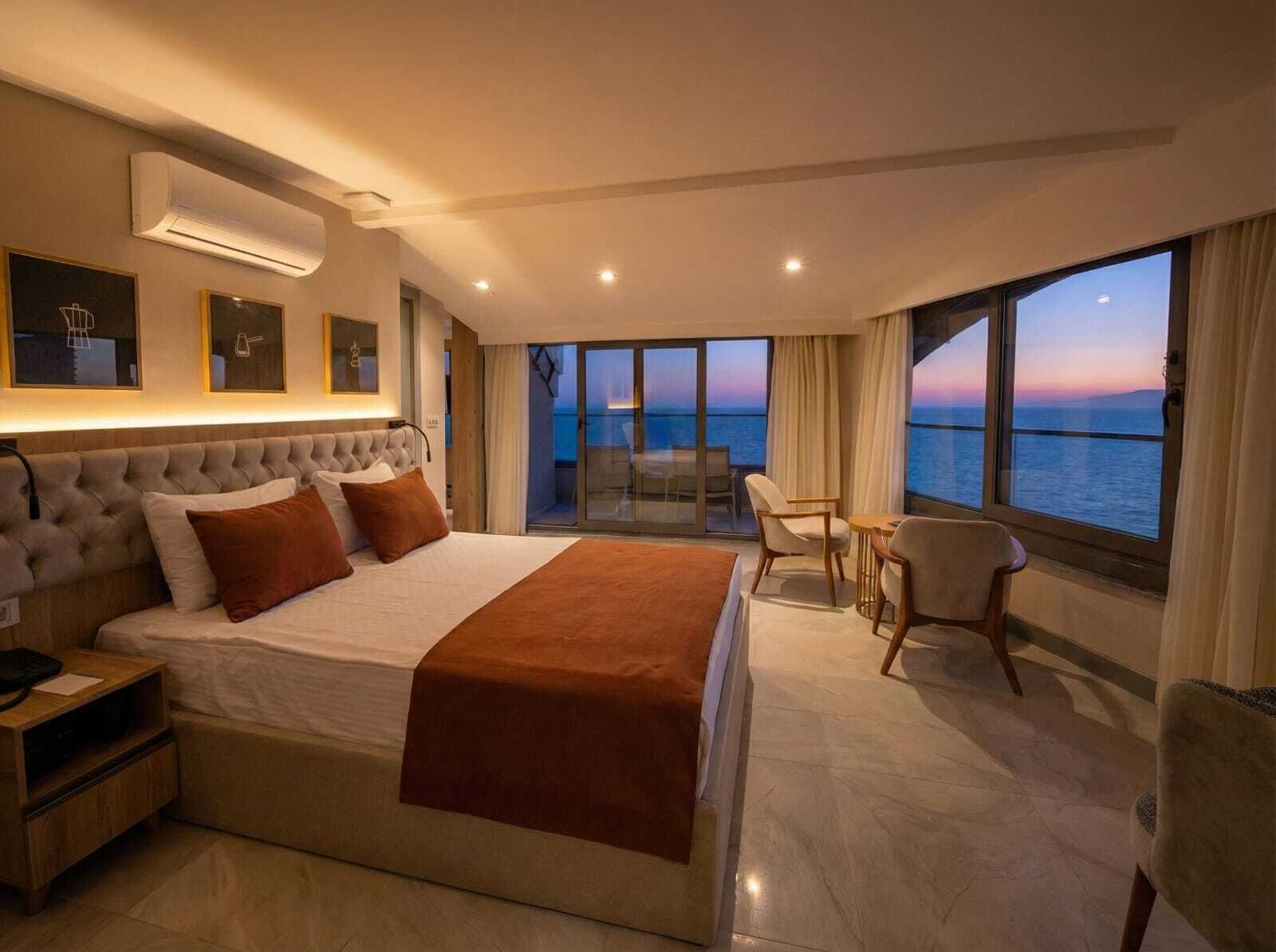 Panoramic Sea View King Suite | Luxe beddengoed, een minibar, verduisterende gordijnen