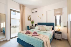 1 bedroom, desk, iron/ironing board, travel crib