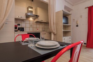 Basic Apartment, Balcony | Dining room